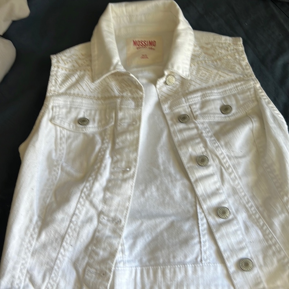 White denim sleeveless jacket for sundresses when it’s hot outside